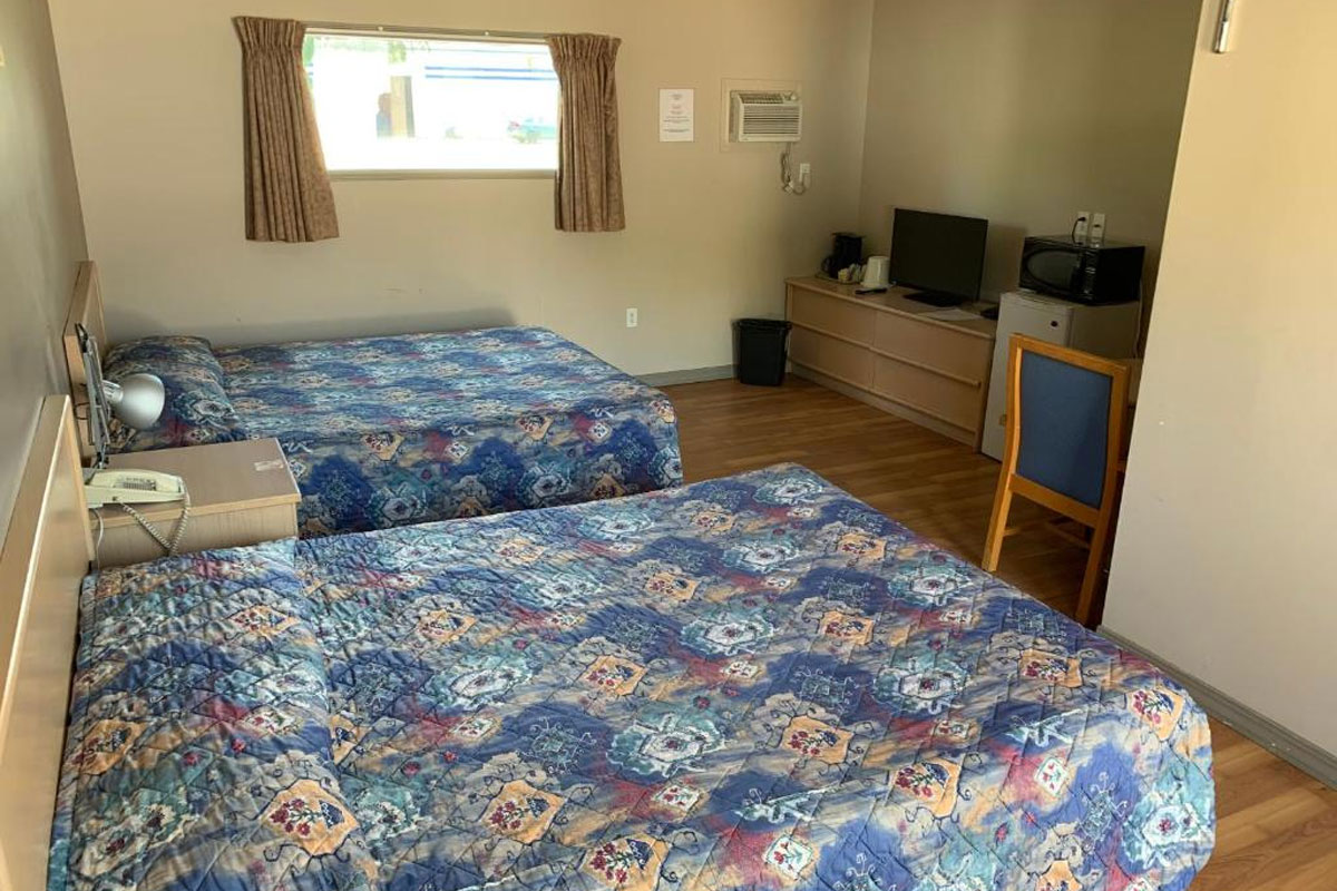 Deluxe Double Queen Bedroom in Minnedosa, MB